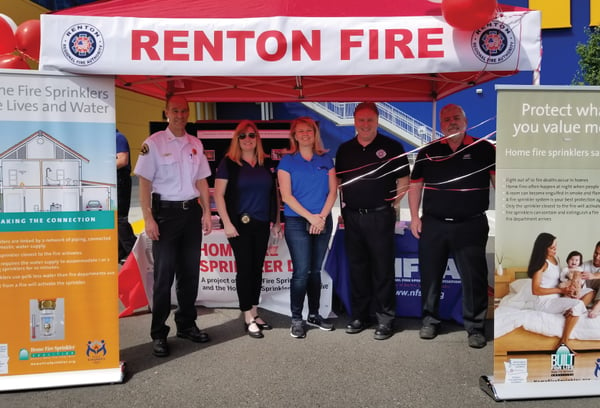 Representatives from the Renton Fire Department talking about home fire sprinklers