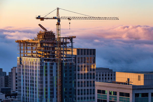 construction in downtown seattle with clouds in the background