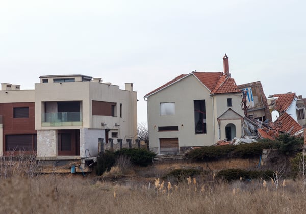 Homes severely damaged by an earthquake