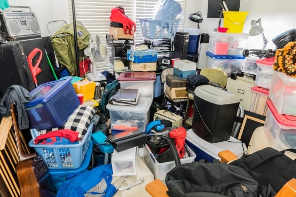 Clutter fills a room and prevents firefighters from entering