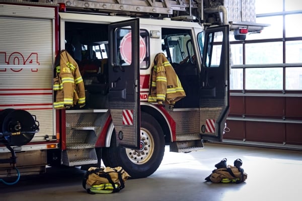 A fire truck and firefighting gear