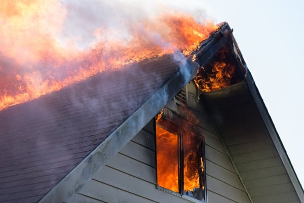 The attic of a home burning