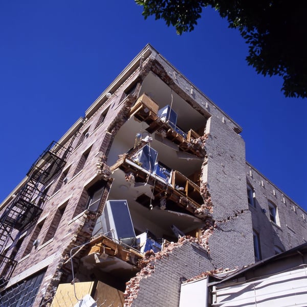 An apartment building damaged by an earthquake