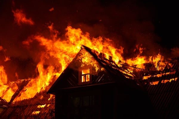 A home burning in a wildfire