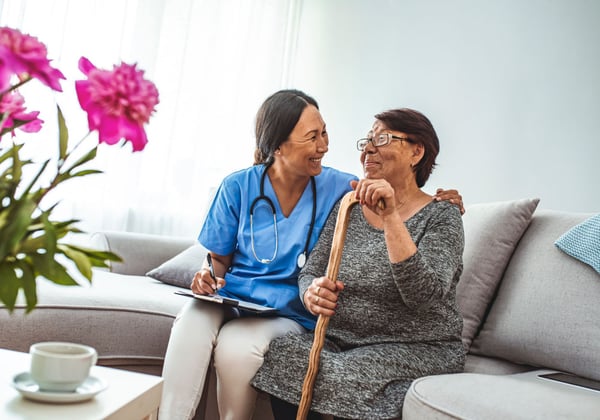 A resident and caregiver at an adult family home